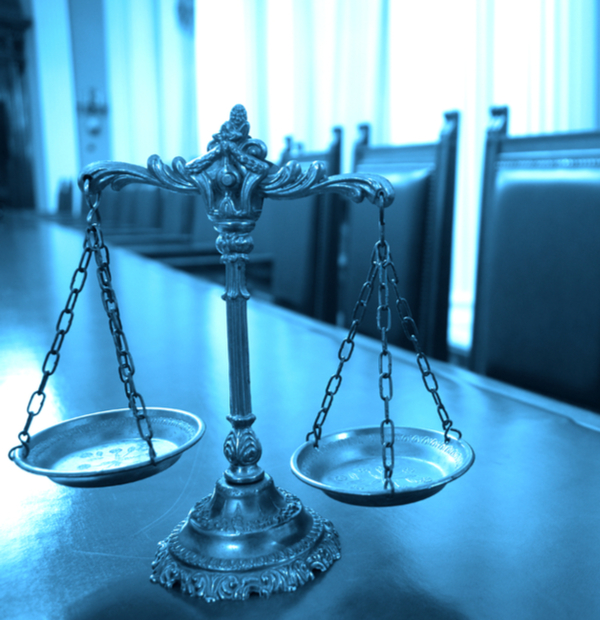 Scales of justice and chairs