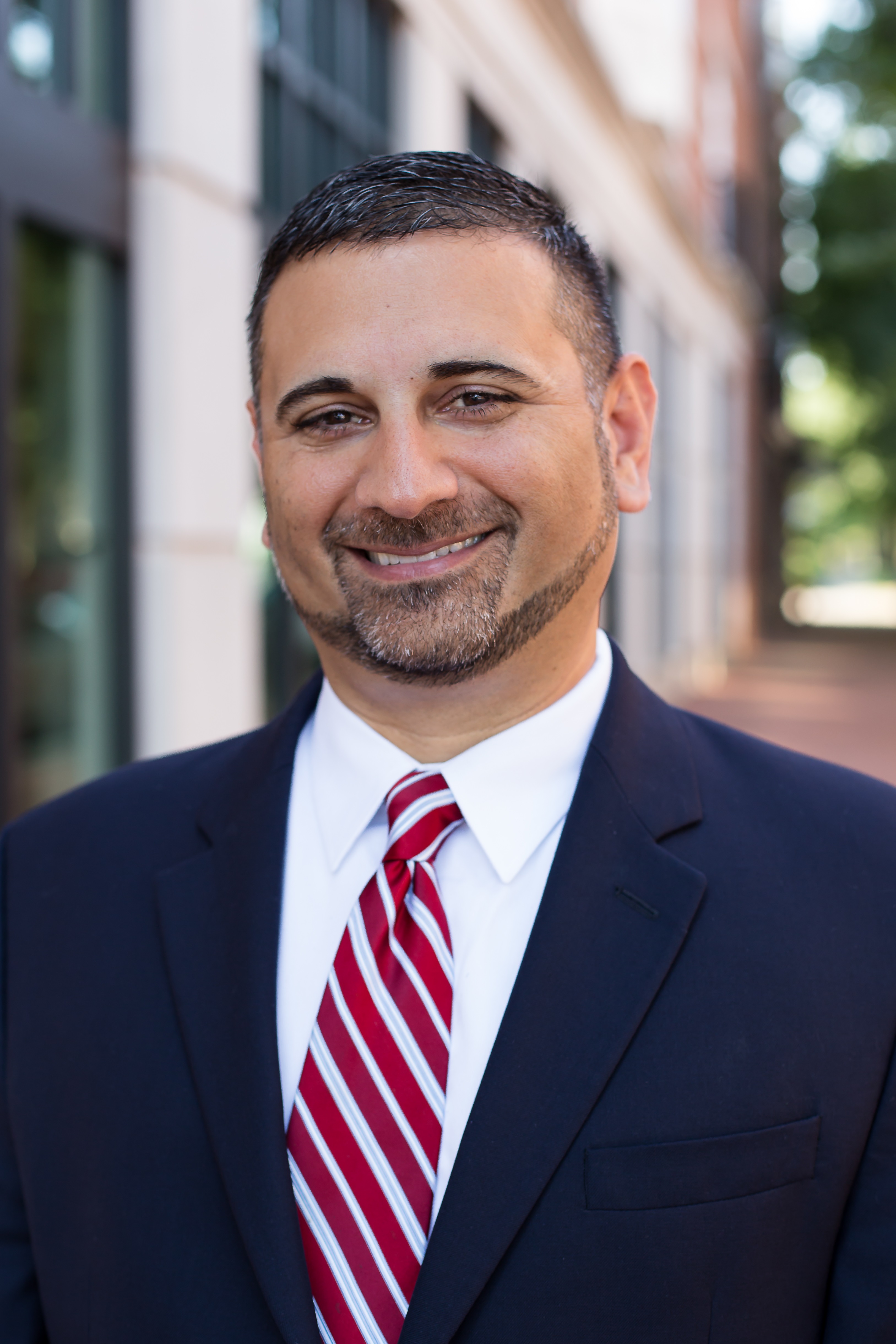 Tad Thomas wearing a dark suit