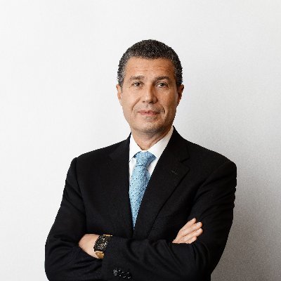 Antonio Romanucci wearing a dark suit