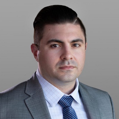 headshot of Travis Daniels