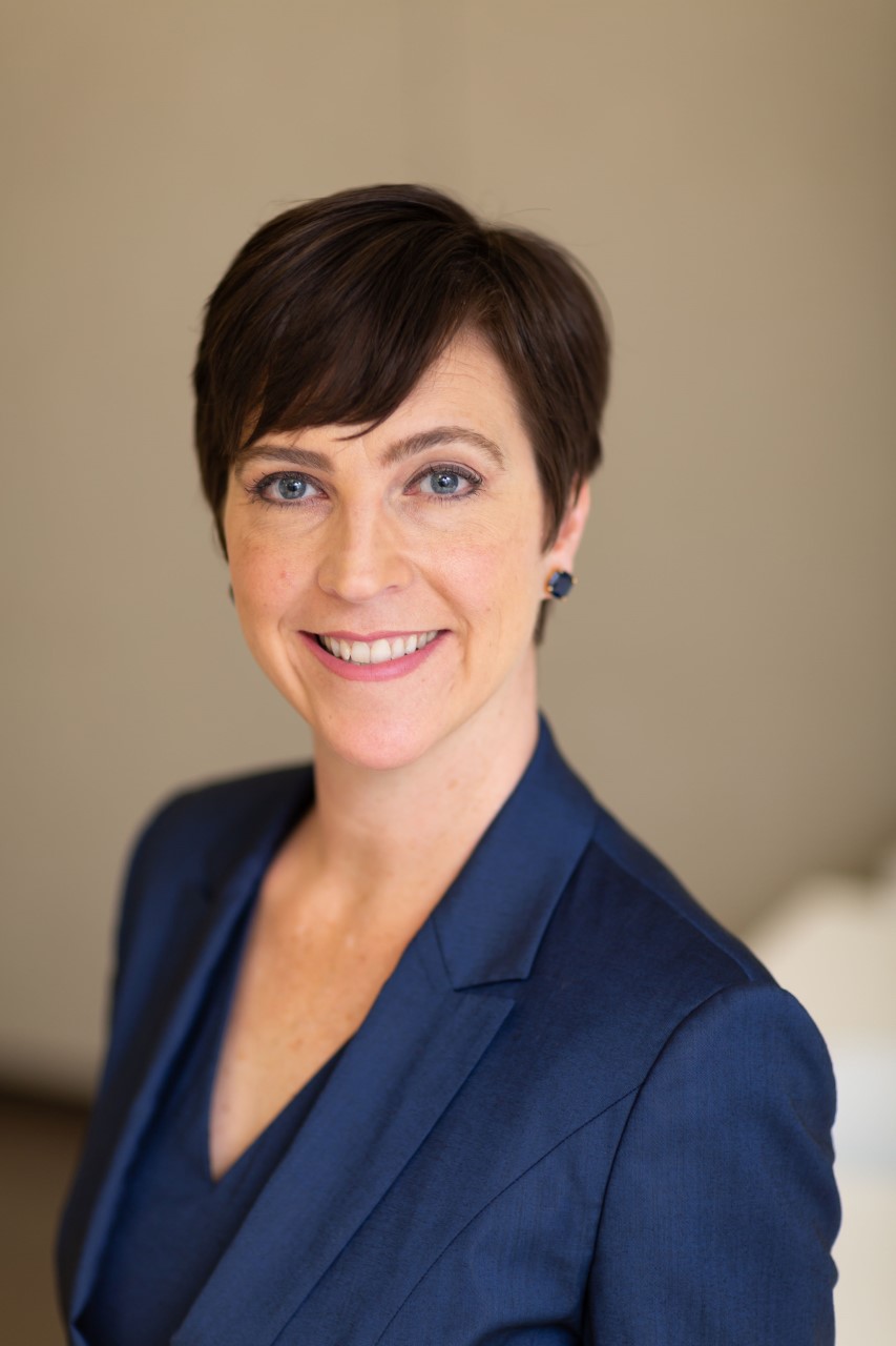 Lori Andrus in blue suit