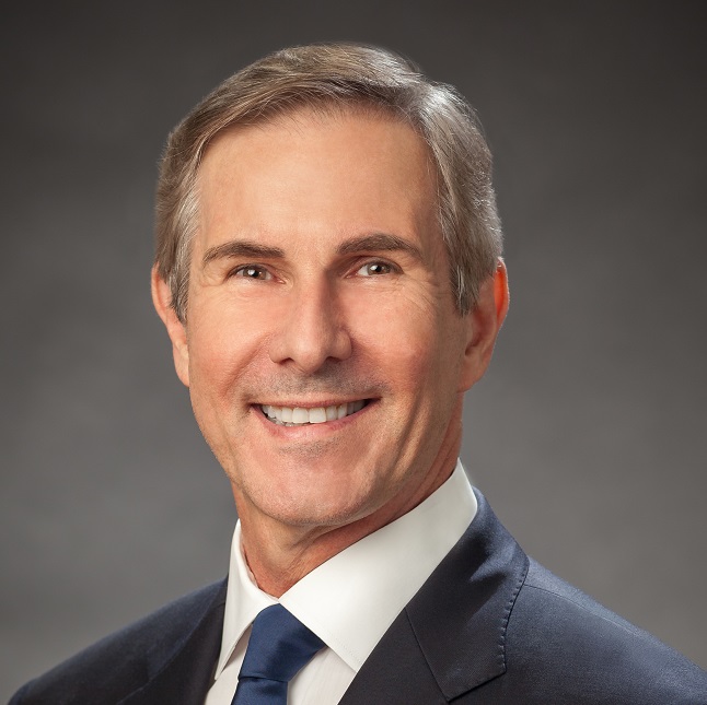 Mark Kitrick wearing a dark suit and tie