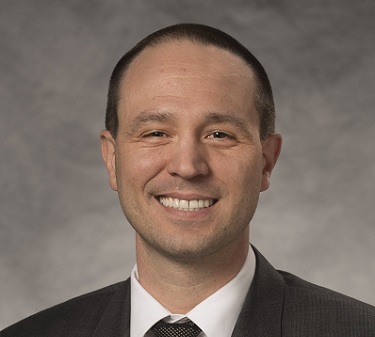 Domenic Sanginiti black suit