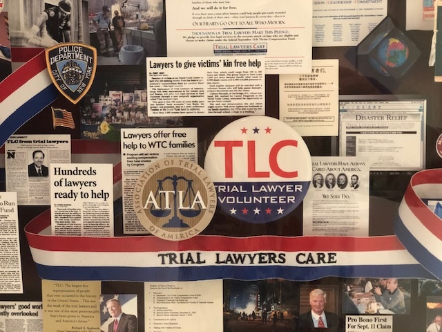 Display case with mementos from Trial Lawyers Care.