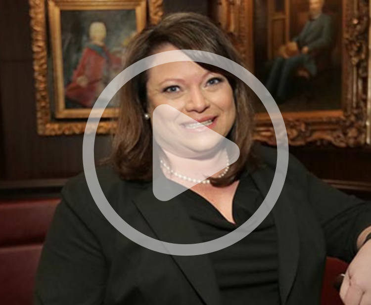 Photo of Yvonne Flaherty with video play button
